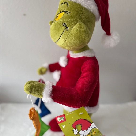 The Grinch Holding Stockings Plush Greeter 19.69inch NWT. - Picture 2 of 4